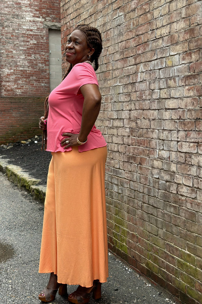 palazzo pant in tissue peach styled with the sola t in tissue berry