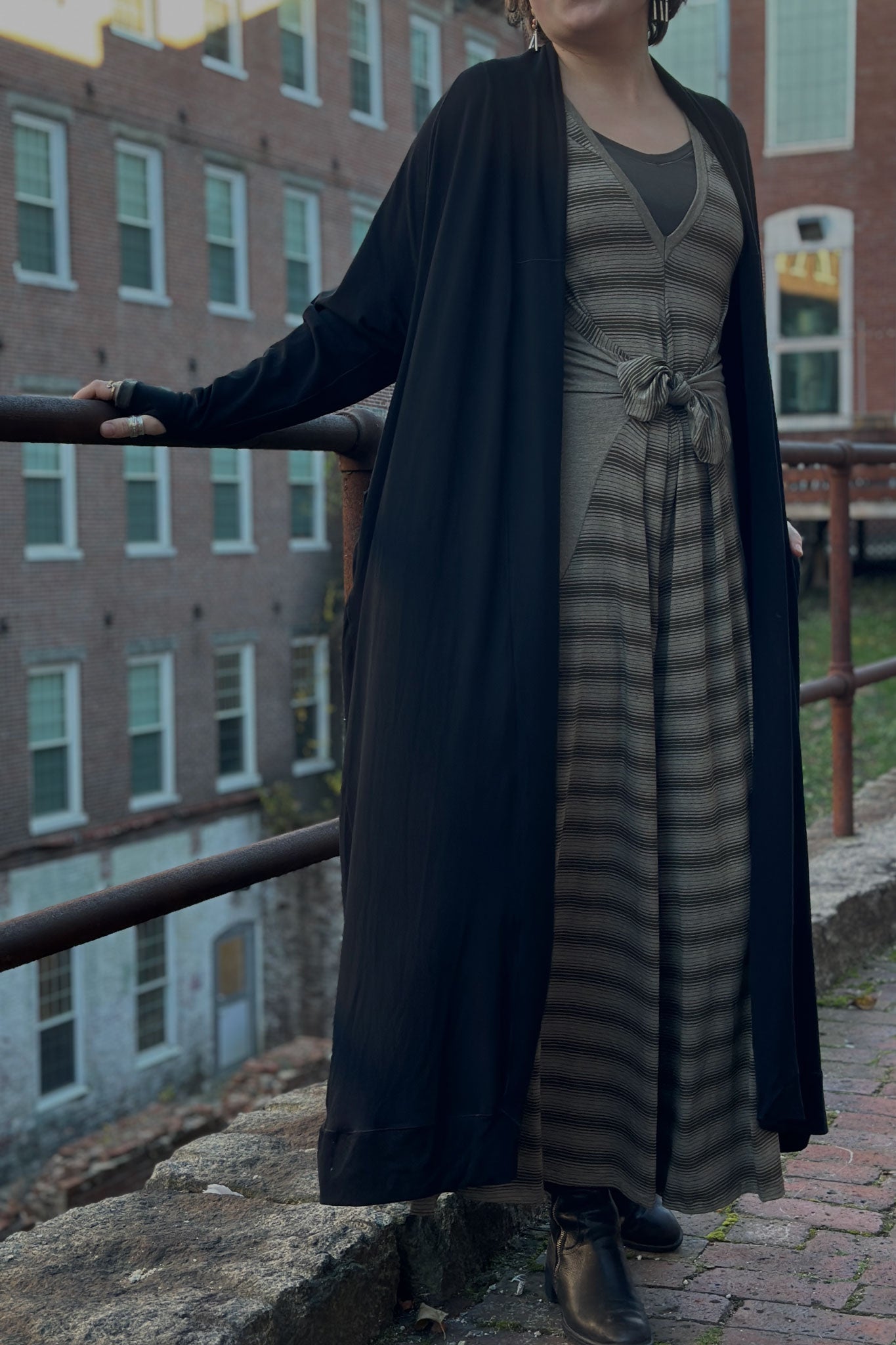 farmer in country stripe with black duster