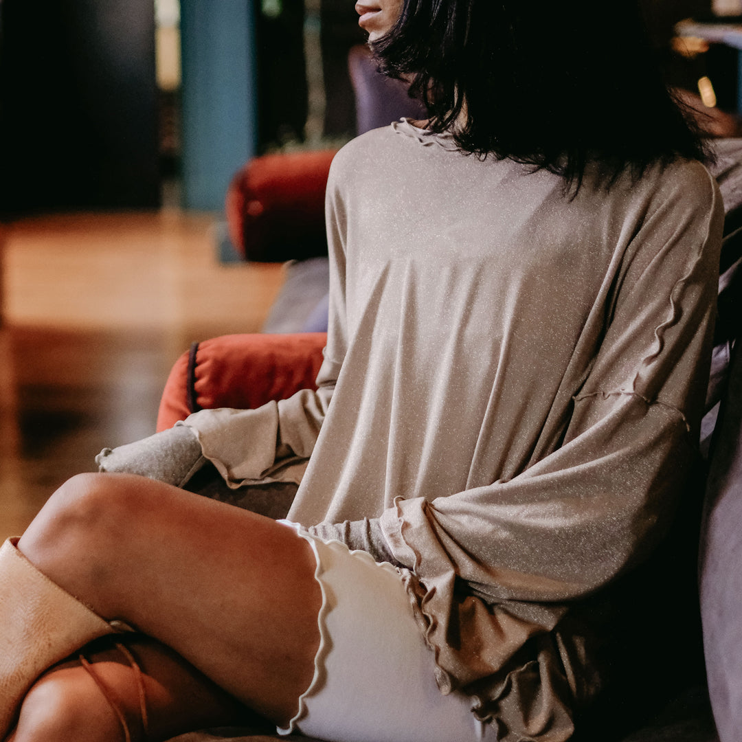 champagne shimmer truly top with milk pencil skirt and gold shimmer opera sleeves