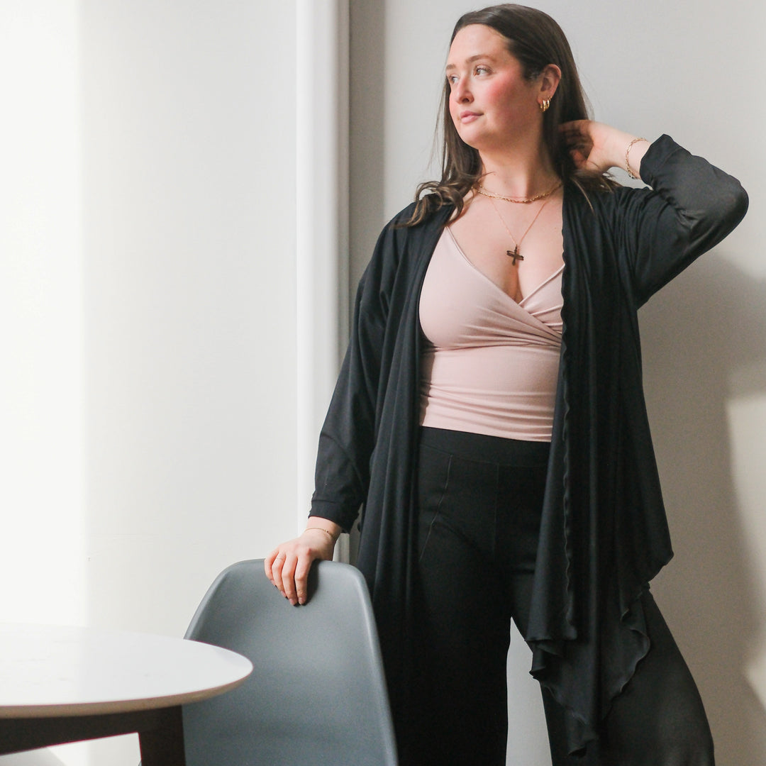 prima jacket in black paired with cross top in ballet and harlow pants in black