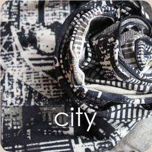 Cape sans manches à plusieurs niveaux MANTRA