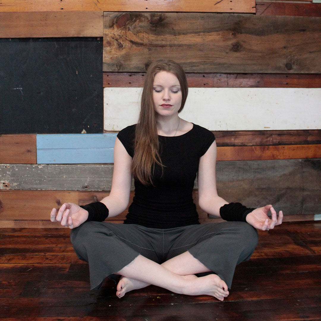 black suger cap tunic with ore kick pant in yoga meditation