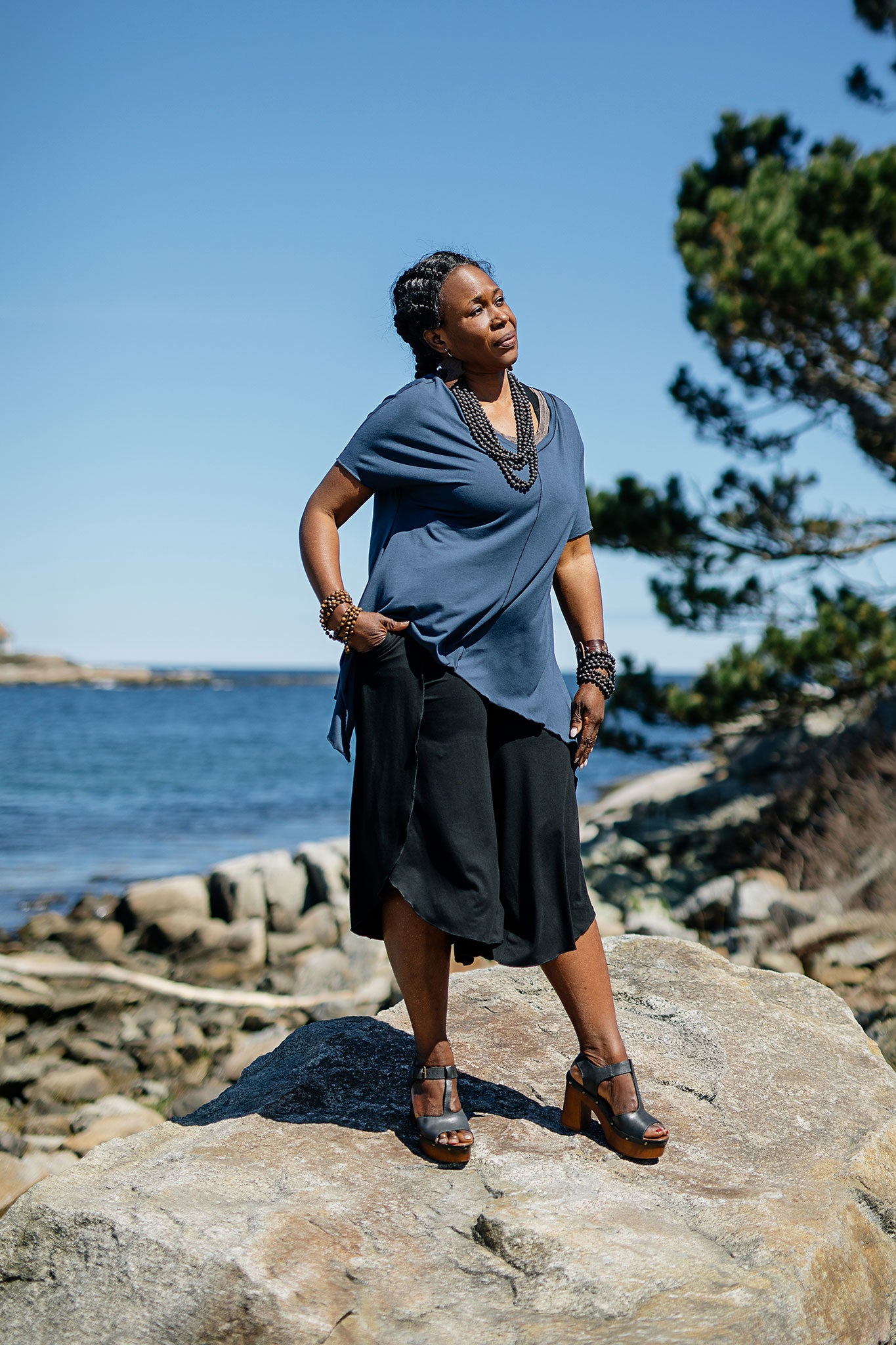 petal pant in black paired with breeze top in navy