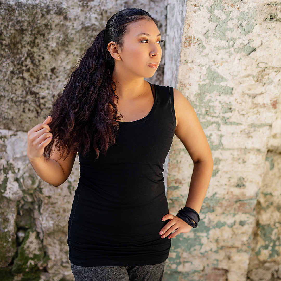 core essential tank in black with carbon band around wrist