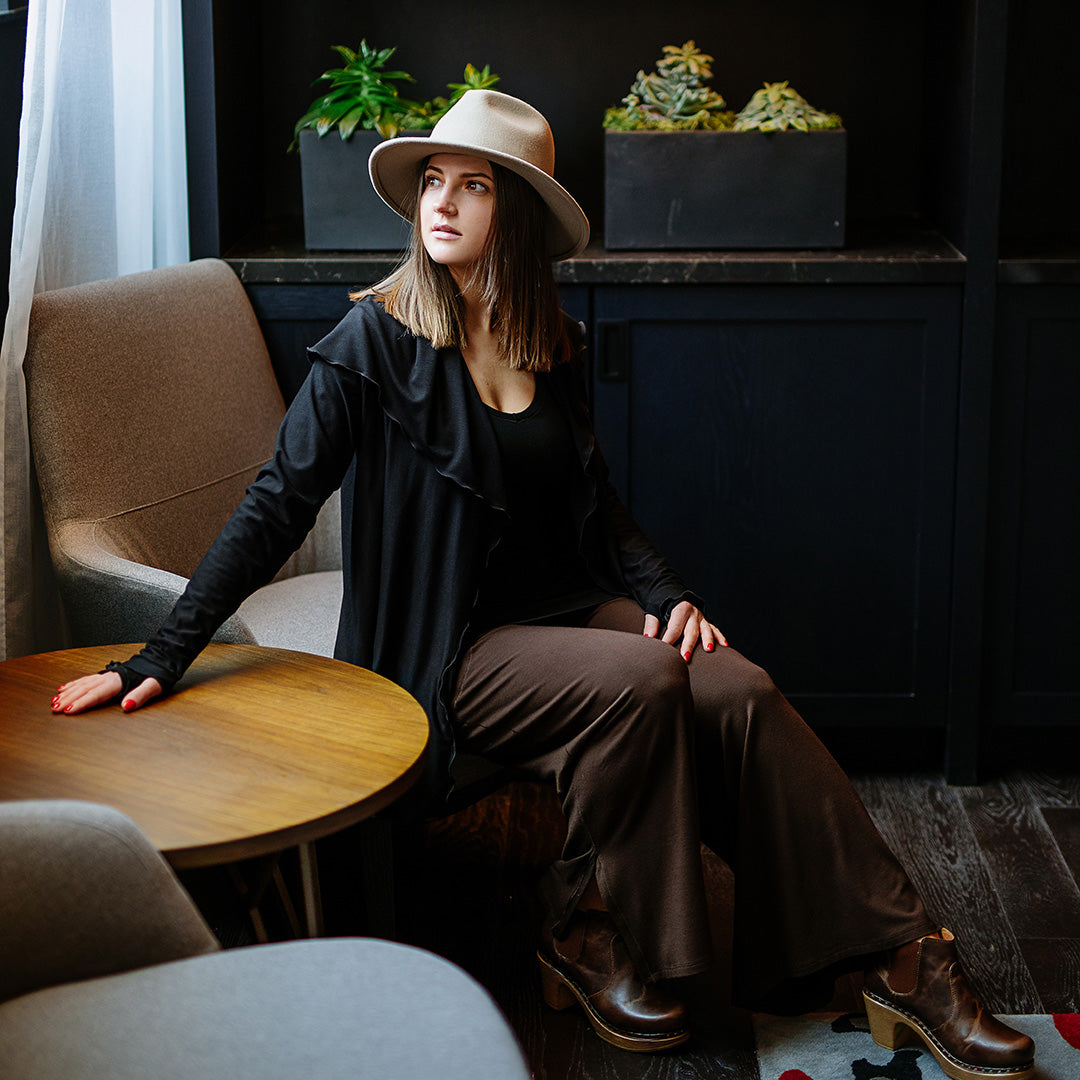 cardi in black paired with vital in black and harlow pant in peat