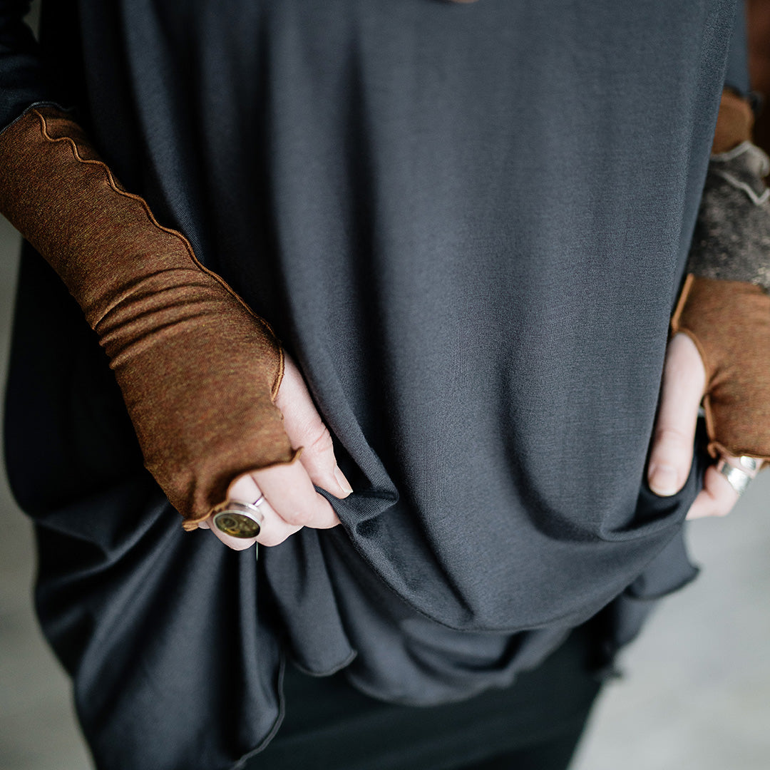 aria gloves in almond with black playsuit and carbon swing top