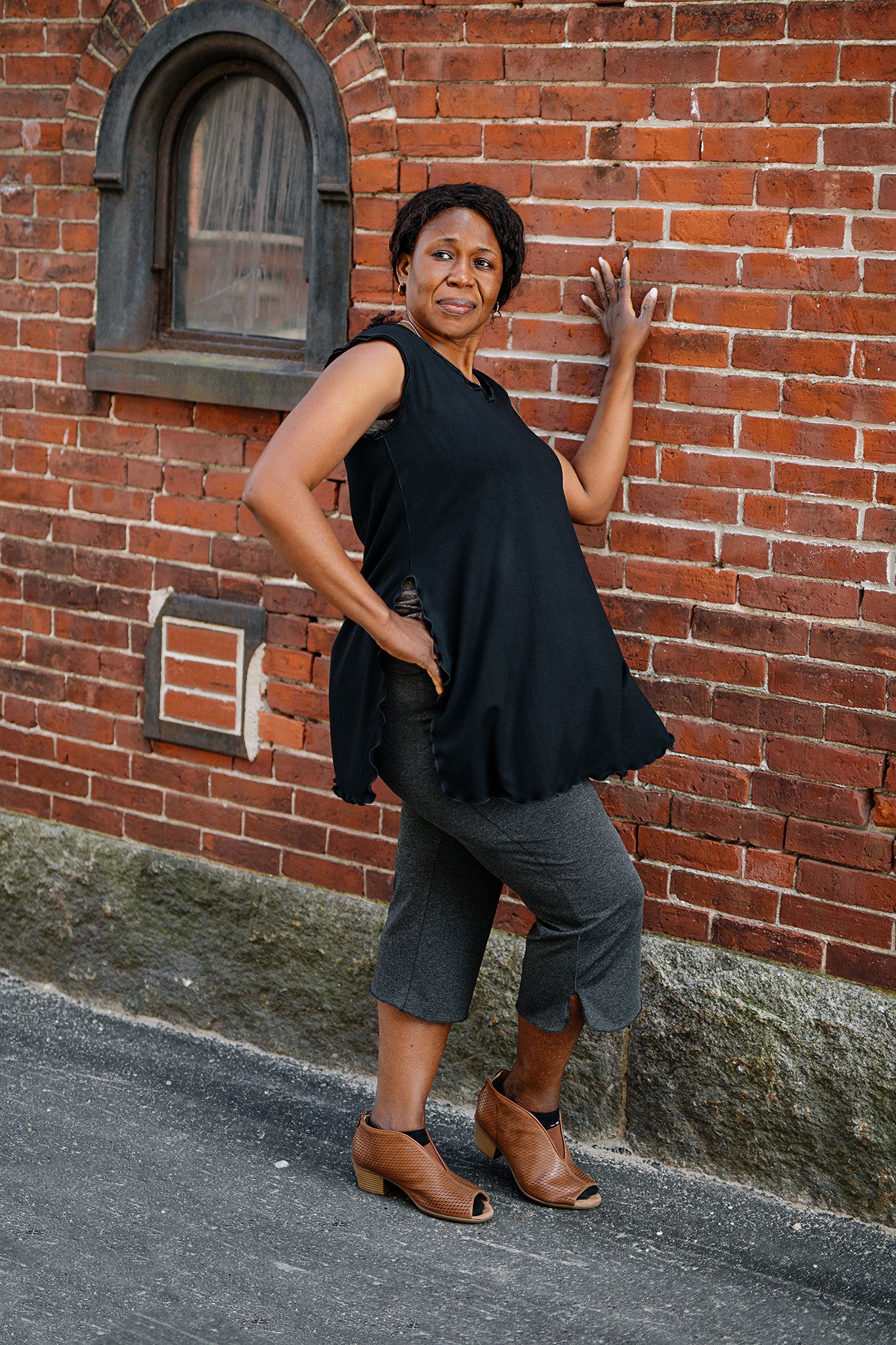 doublet layer top in black paired with kick pant in charcoal