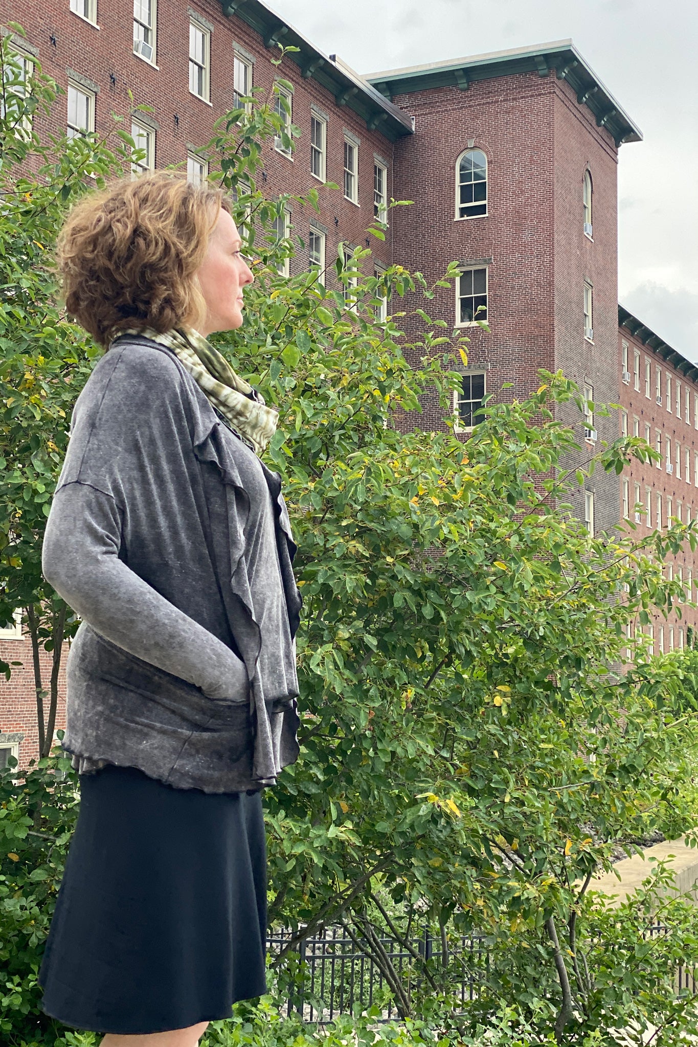 suger® flip skirt in black paired with mineral river + olive handdye loop