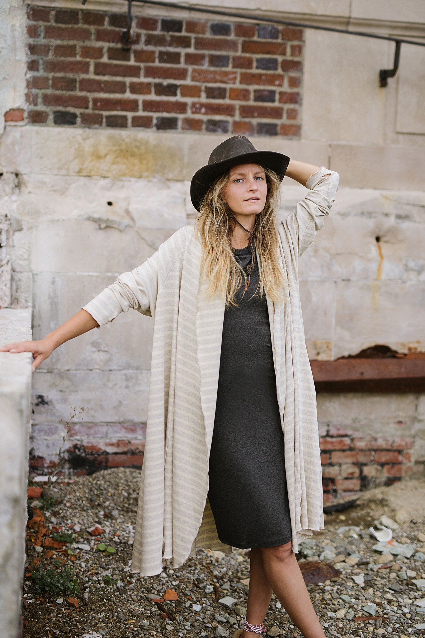 garden coat in dune over sheath dress in charcoal