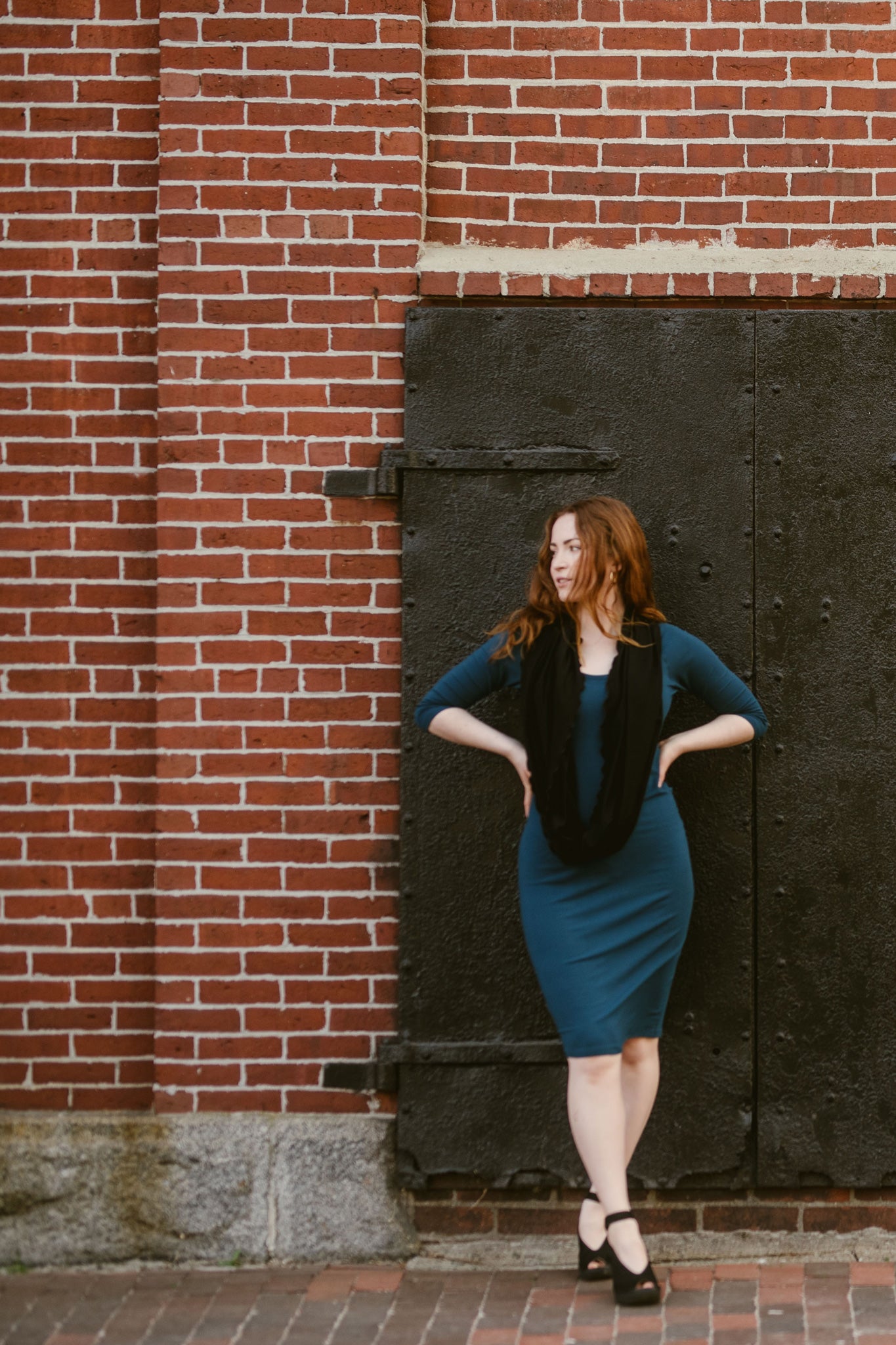 noble elegant dress in lagoon with black loop around neck