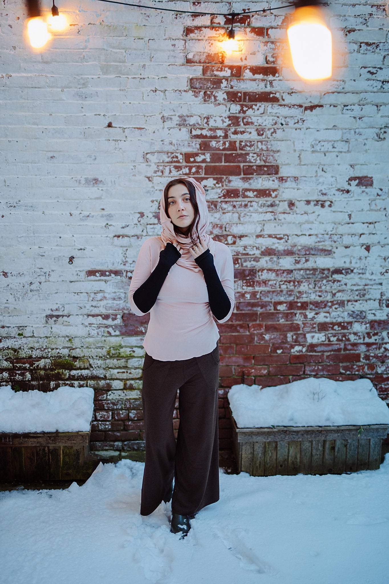 harlow elegant convertible wide leg pant in espresso paired with ballet rose top, ballet hourglass as a hood, and black opera sleeves