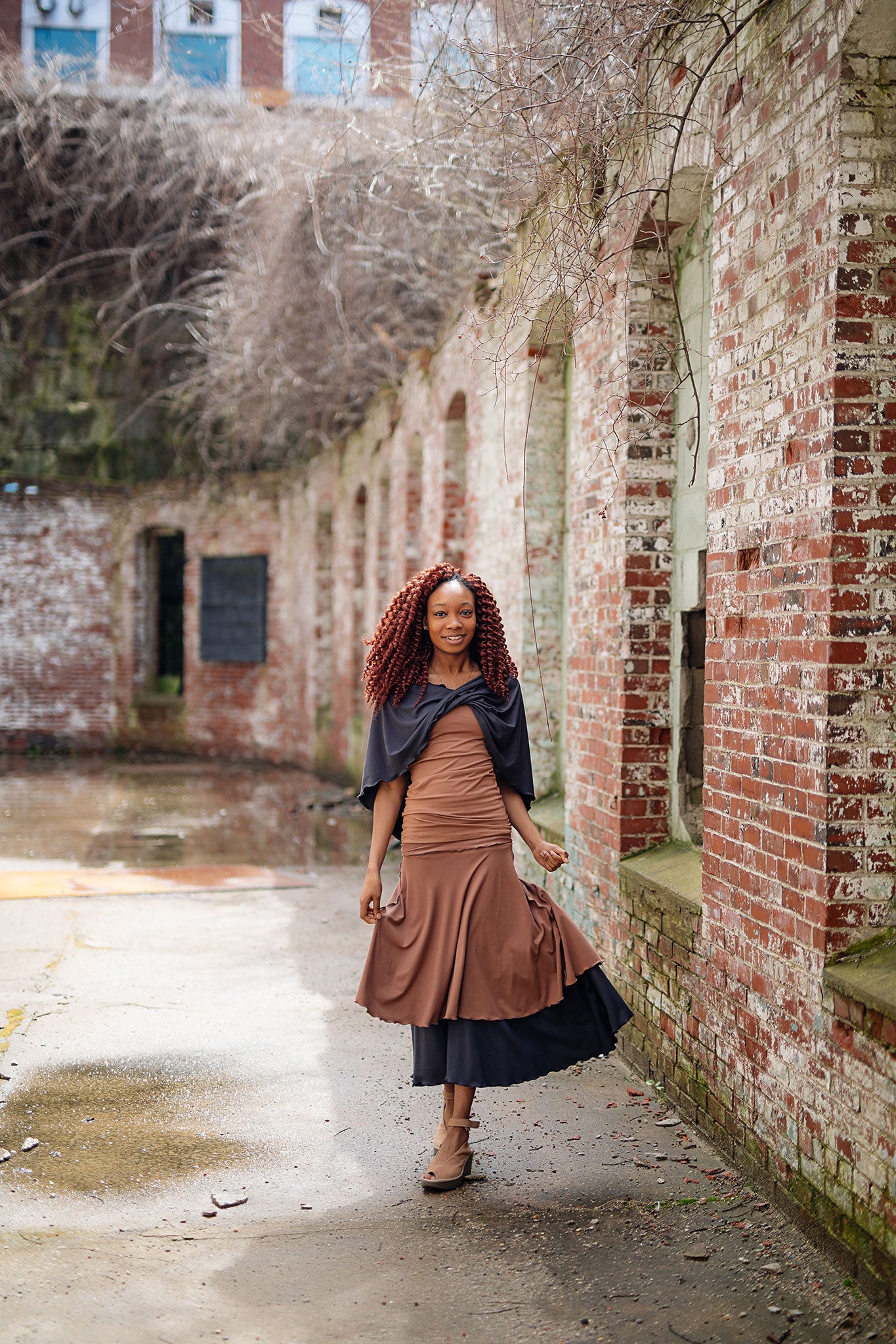 layered lady flirts in carbon and cedar, paired with core tank in cedar and loop in carbon worn as a shawl