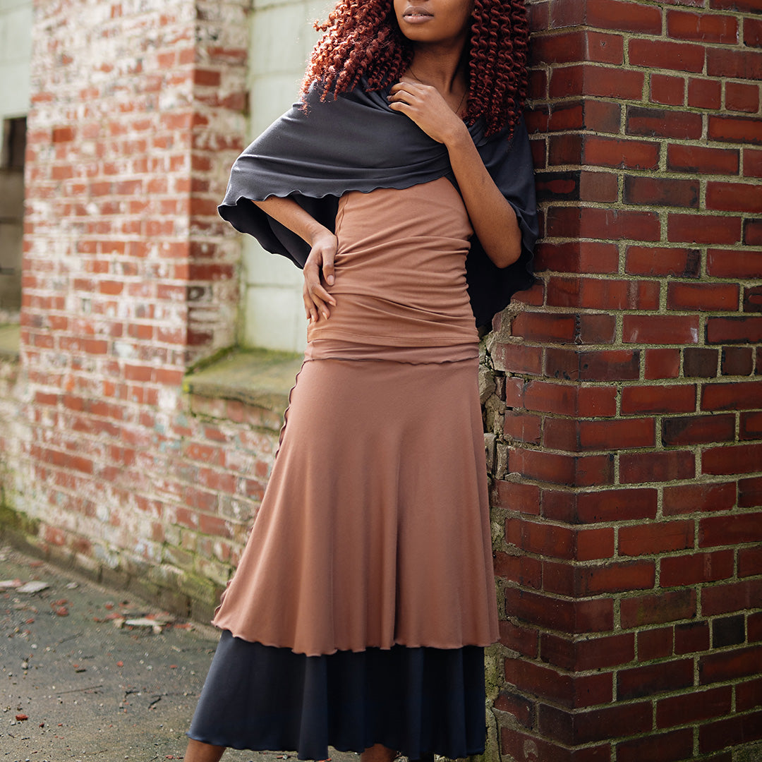 layered lady flirts in carbon and cedar, paired with core tank in cedar and loop in carbon worn as a shawl