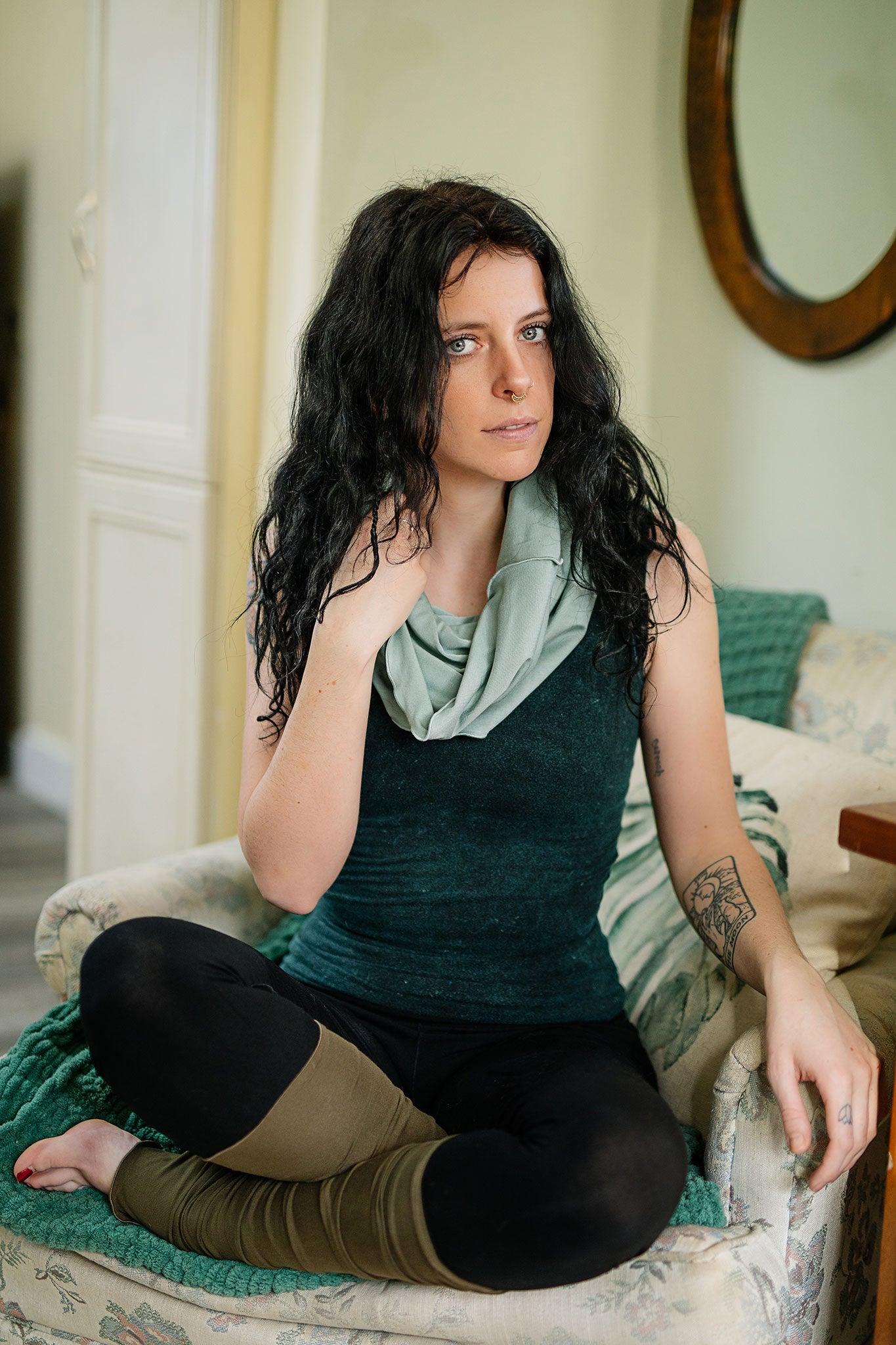 core tank in blue mineral with hourglass in glass, base legging in black, and olive stockings