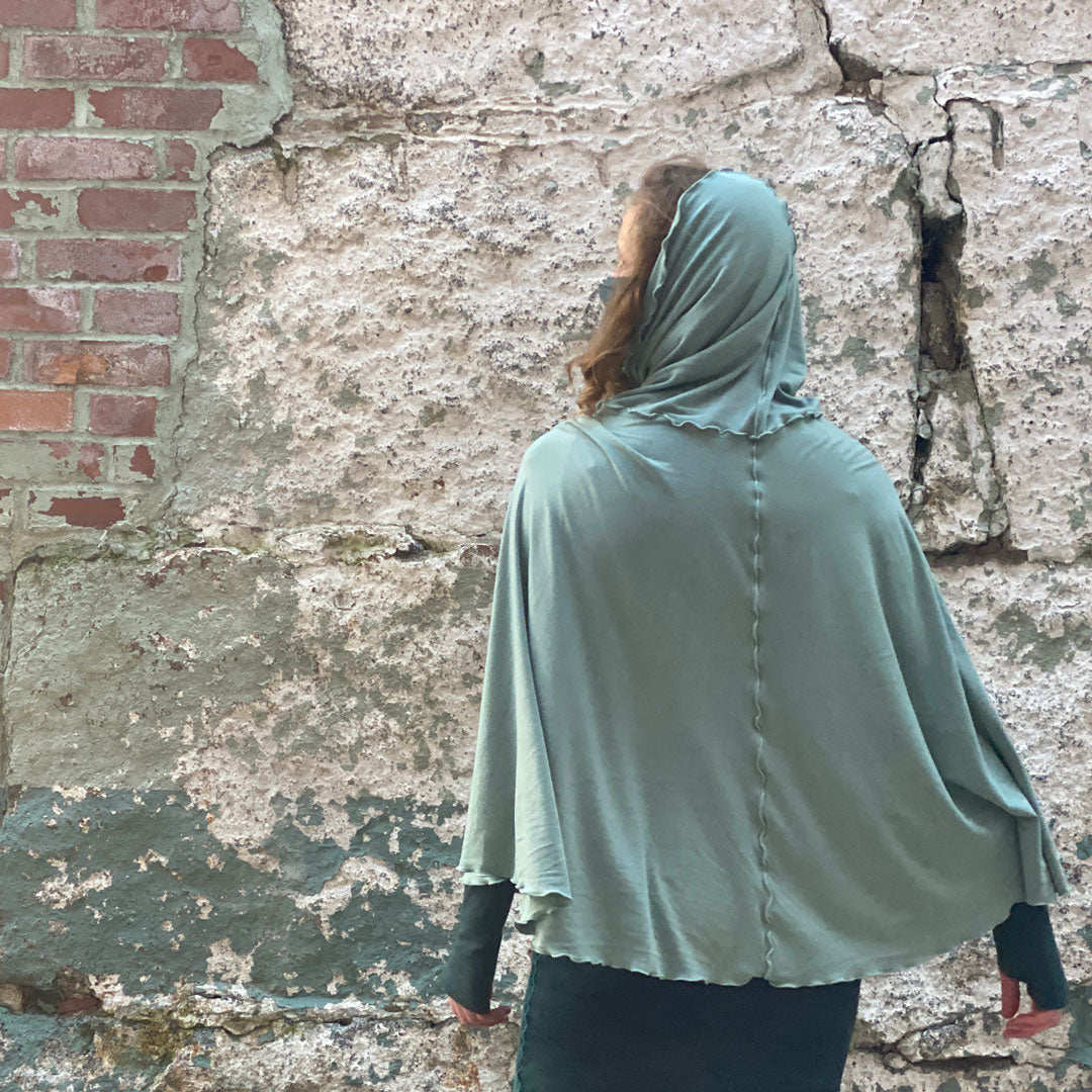 glass lady flirt as a hooded poncho