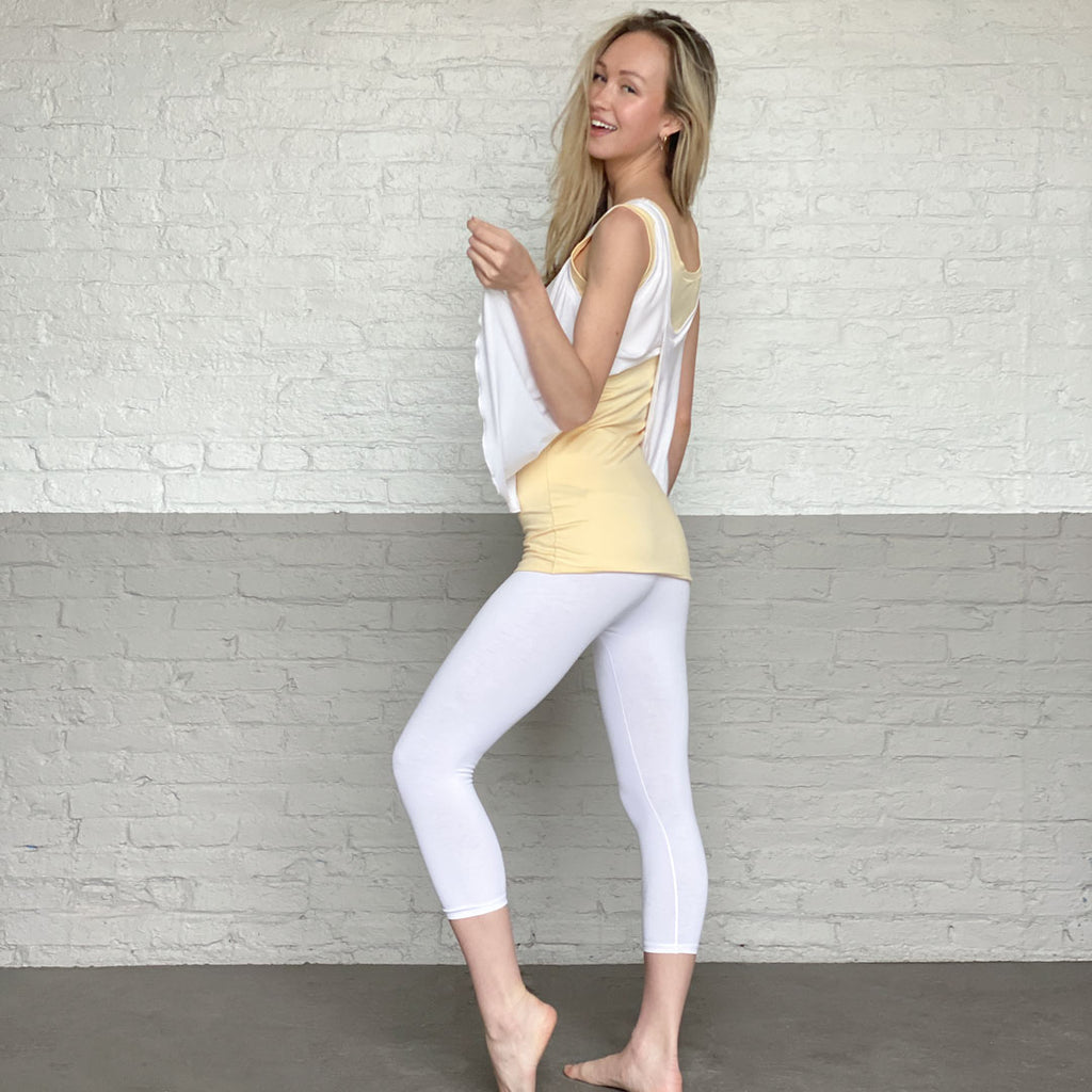 capri base legging in white with core tank in butter and tulip top in white