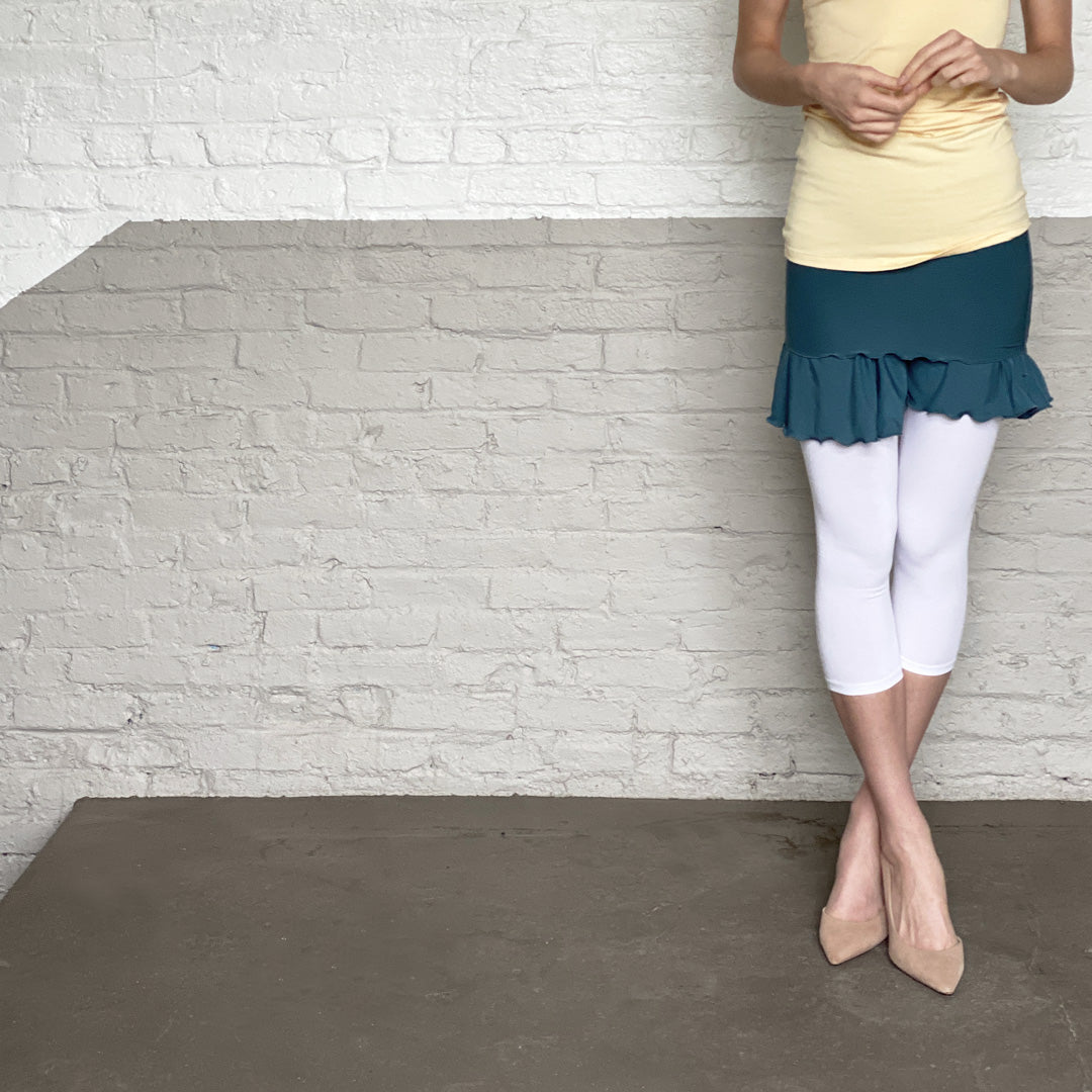 capri base legging in white with ocean romper and butter core tank