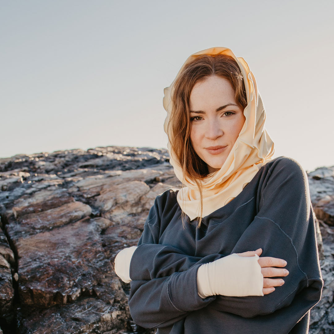 aria fingerless glove in milk with loop as a hood in butter