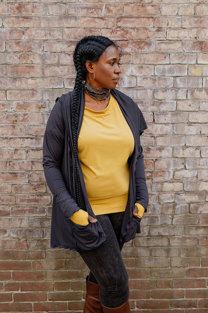 carbon cardi jacket worn over flash top in amber and base leggings in mineral
