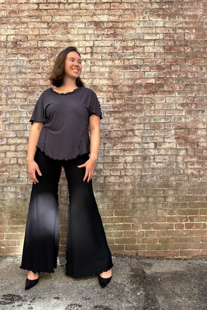 sweet t in carbon + black swirlsuit