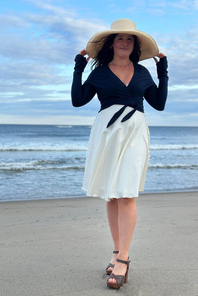 angelrox® dancer reversible dress in milk + white styled with navy rappa