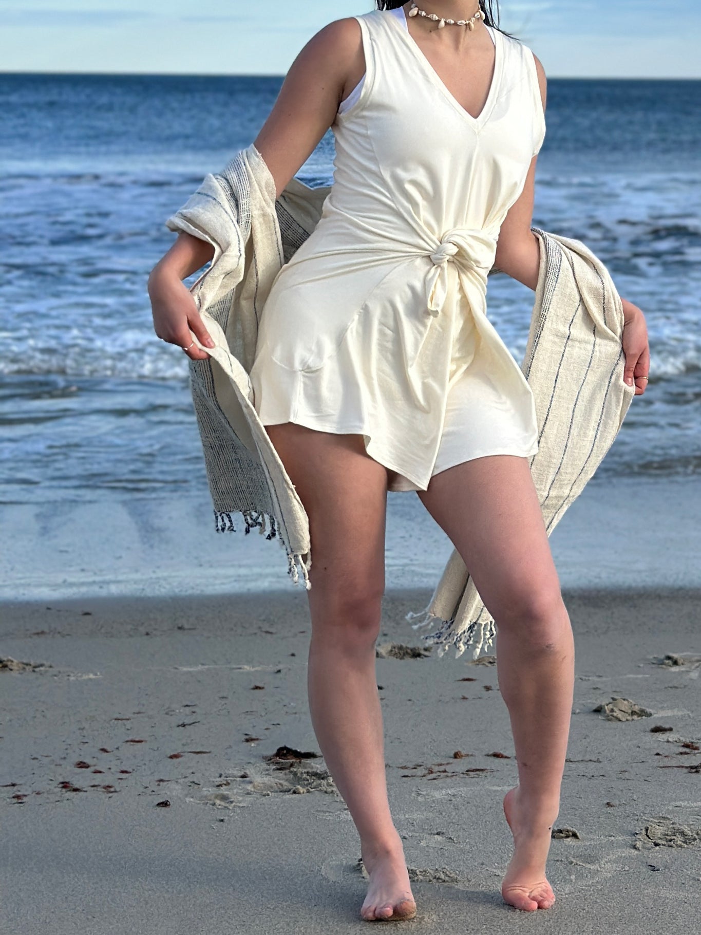 suger® sprout in milk with pockets pulled out tied in front