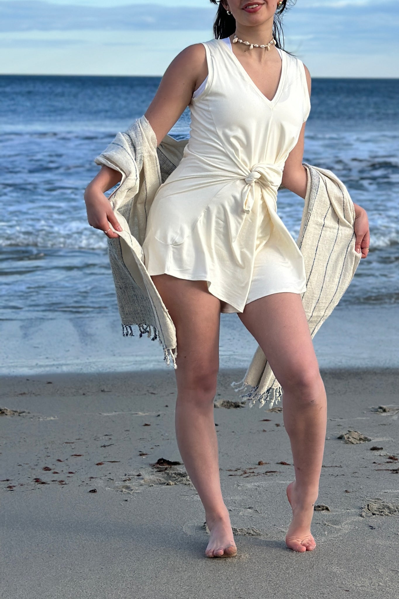 suger® sprout in milk with pockets pulled out tied in front