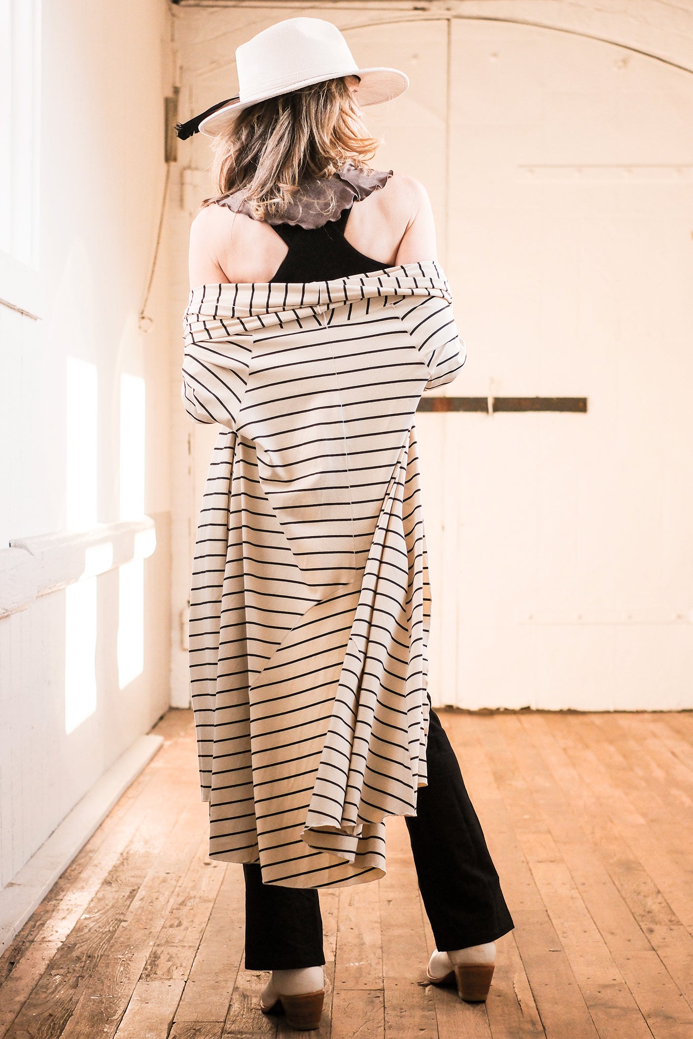 yang riding coat with black yogi pant