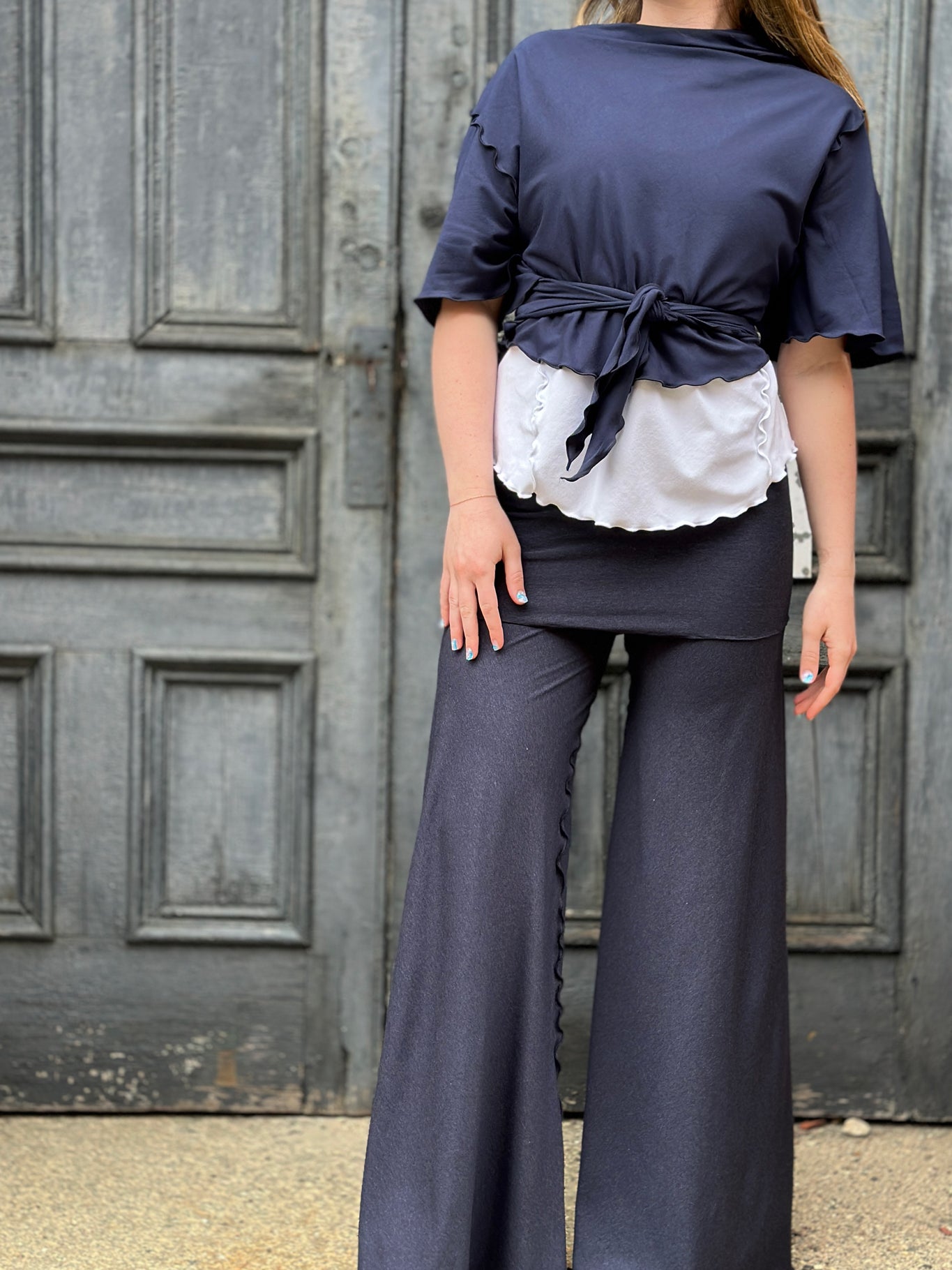 angelrox® flutter summer jacket in navy paired with white sweet t + midnight swirlsuit