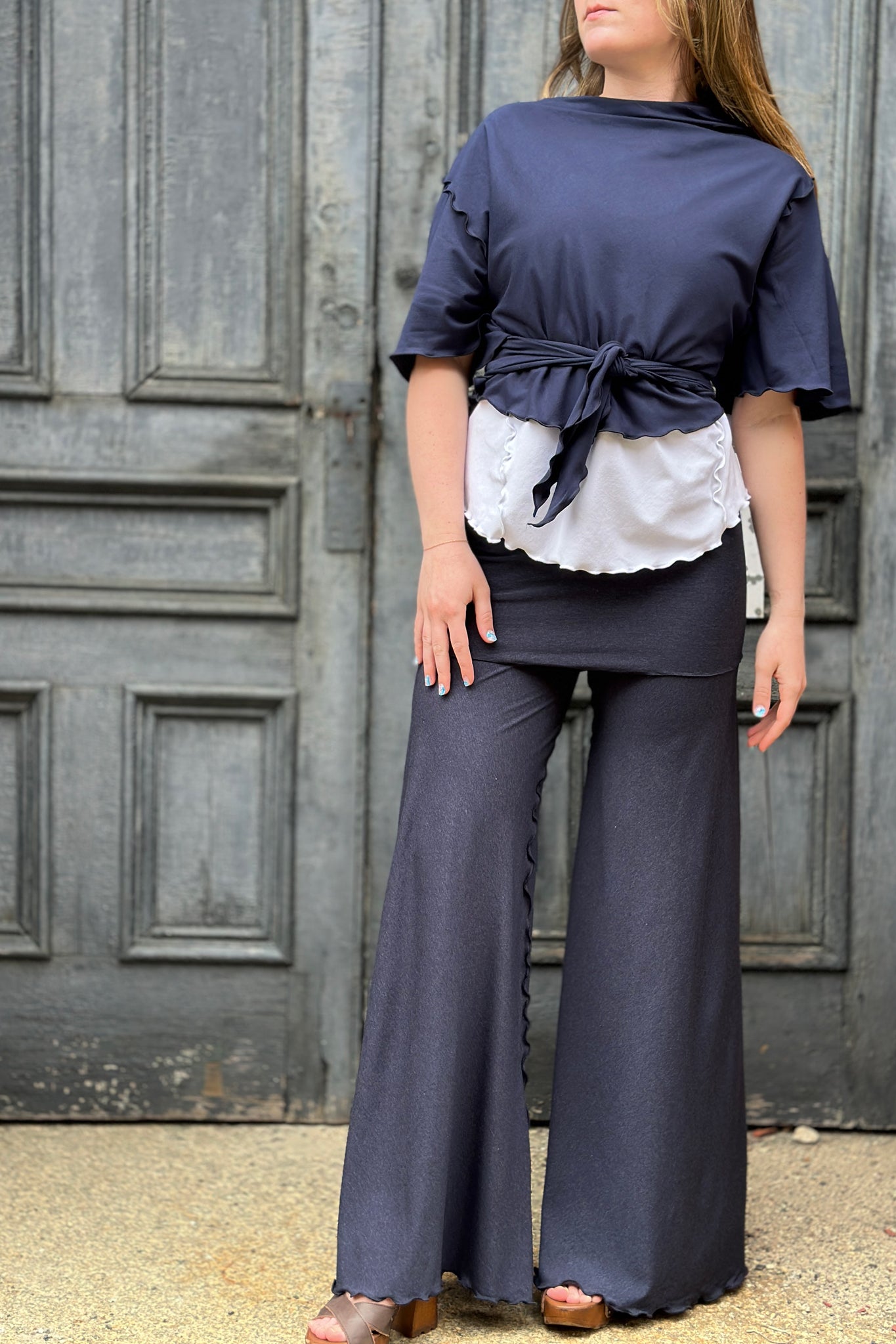 angelrox® flutter summer jacket in navy paired with white sweet t + midnight swirlsuit