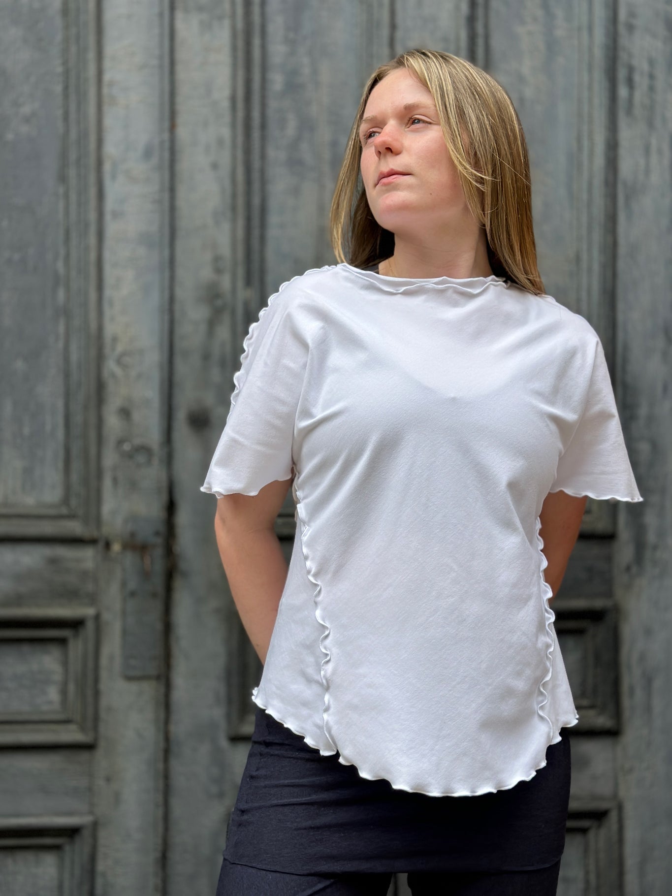 sweet t in white styled with midnight swirlsuit