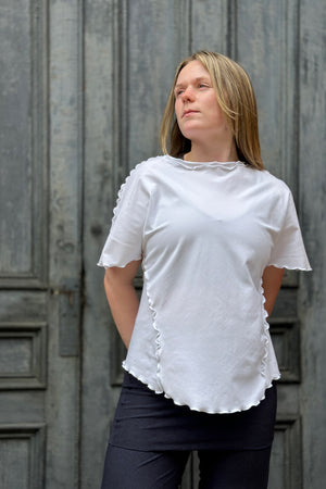sweet t in white styled with midnight swirlsuit