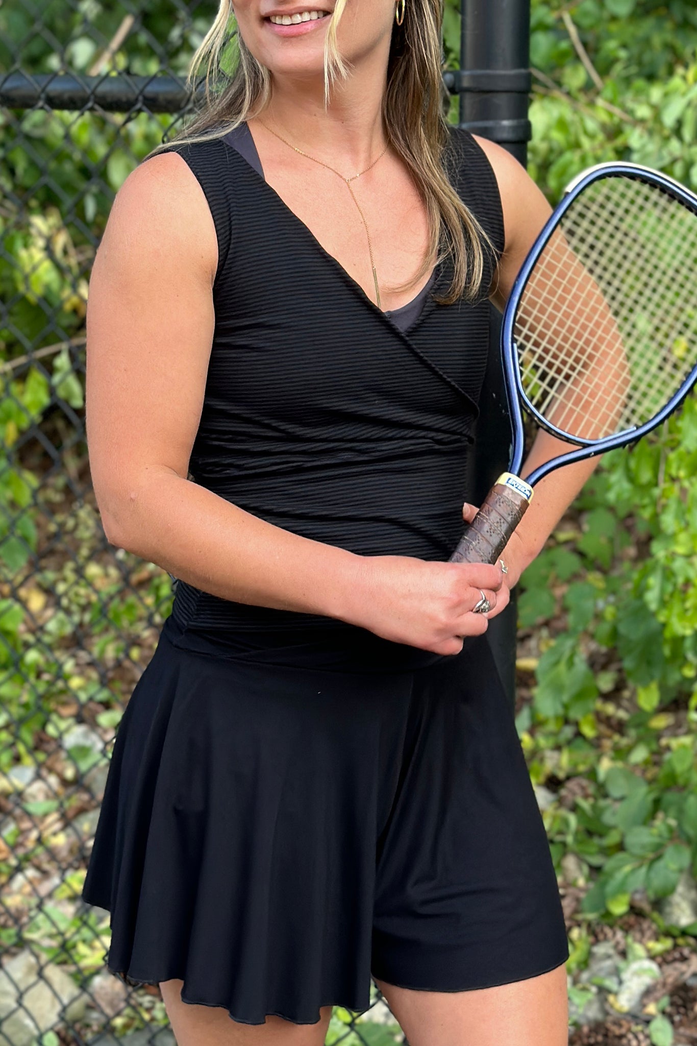 cross top in subtle black stripe with birdie short in black