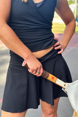 cross top in subtle black stripe with birdie short in subtle black stripe