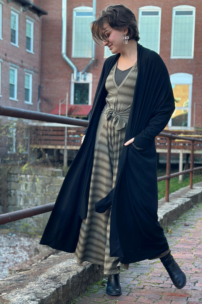 country stripe farmer with fir vneck and black duster