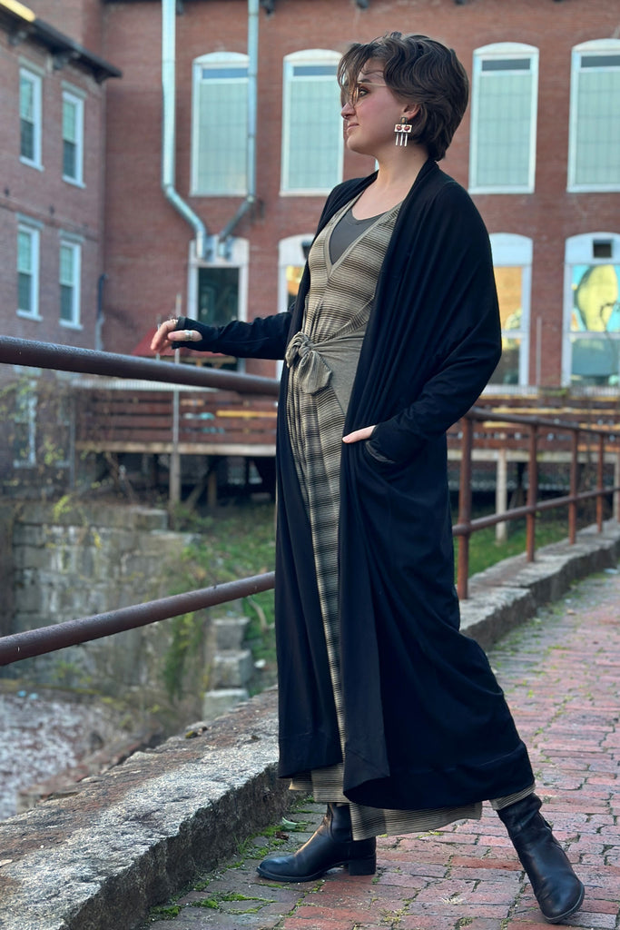 country stripe farmer with fir vneck and black duster