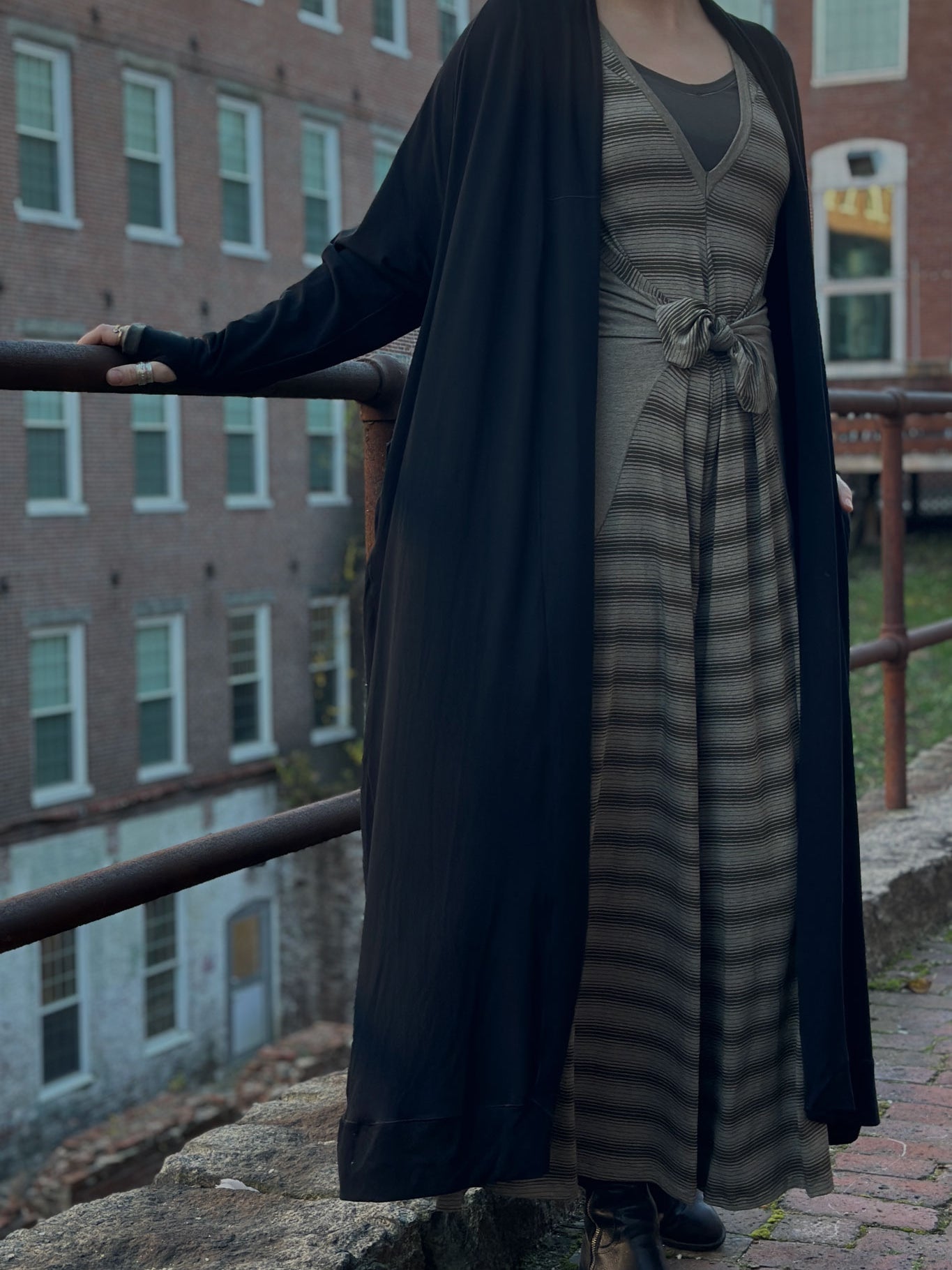 farmer in country stripe with black duster