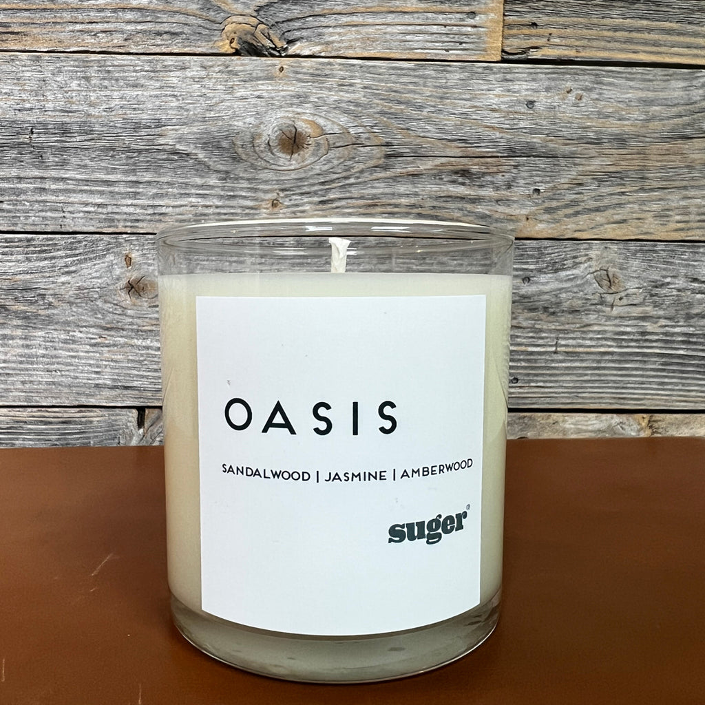 oasis signature suger candle with scents of sandalwood, jasmine and amberwood
