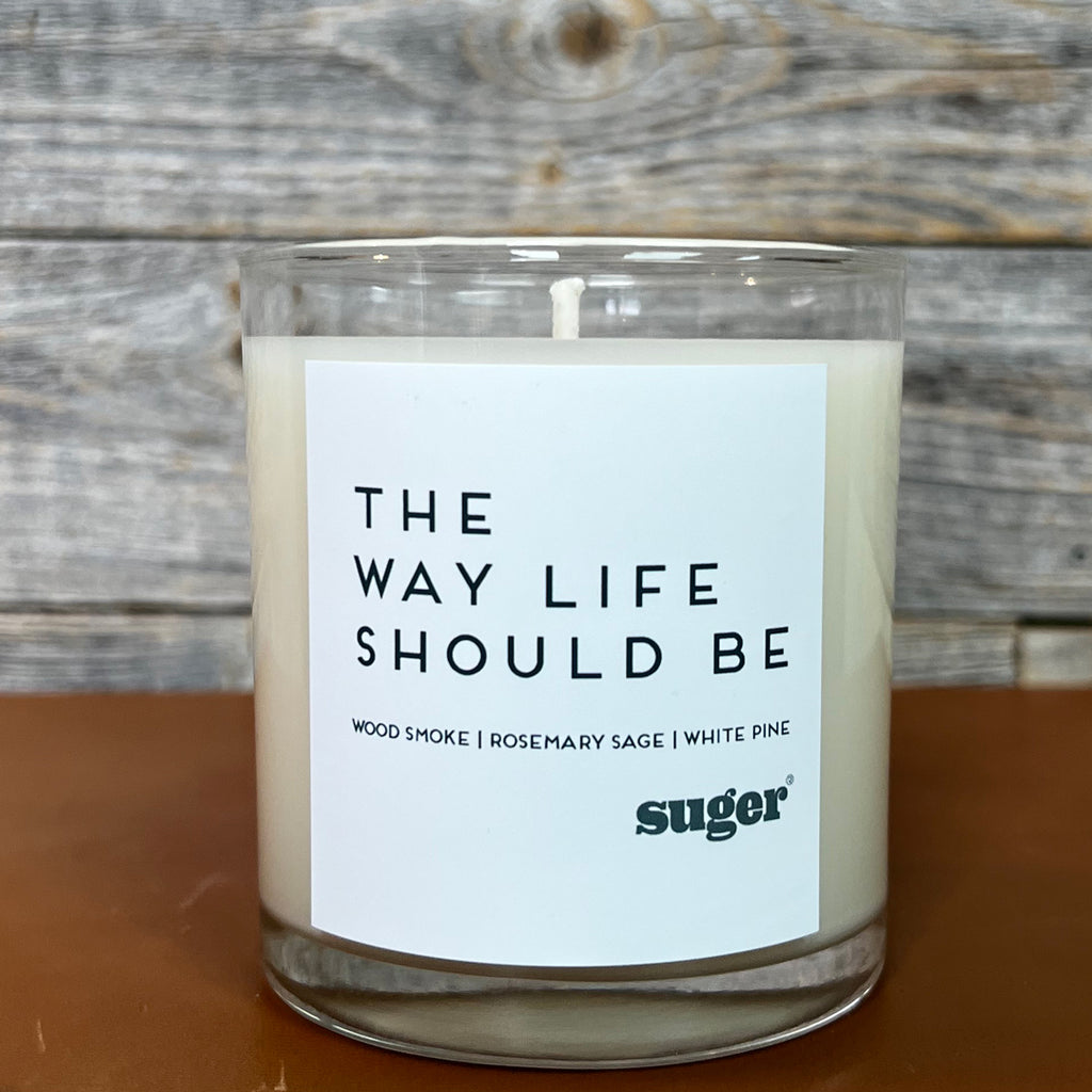 signature suger candle, the way life should be, with scents of wood smoke, rosemary sage and white pine