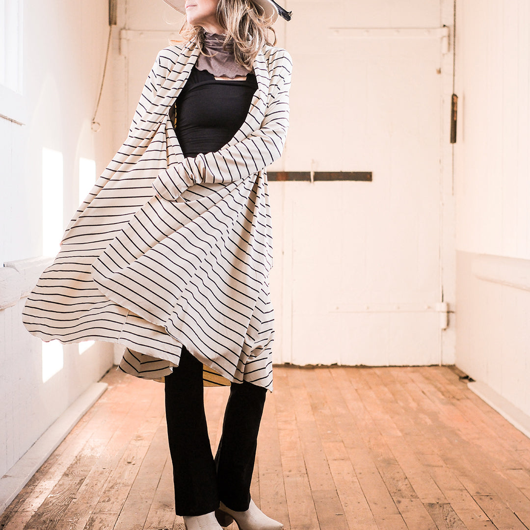 yang stripe riding coat over black yogi pant