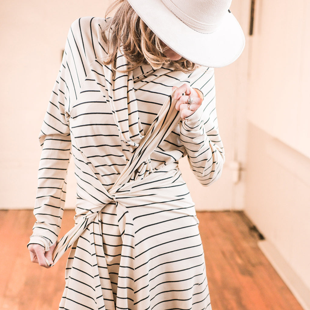 yang stripe riding coat using pockets pulled inside out as closure