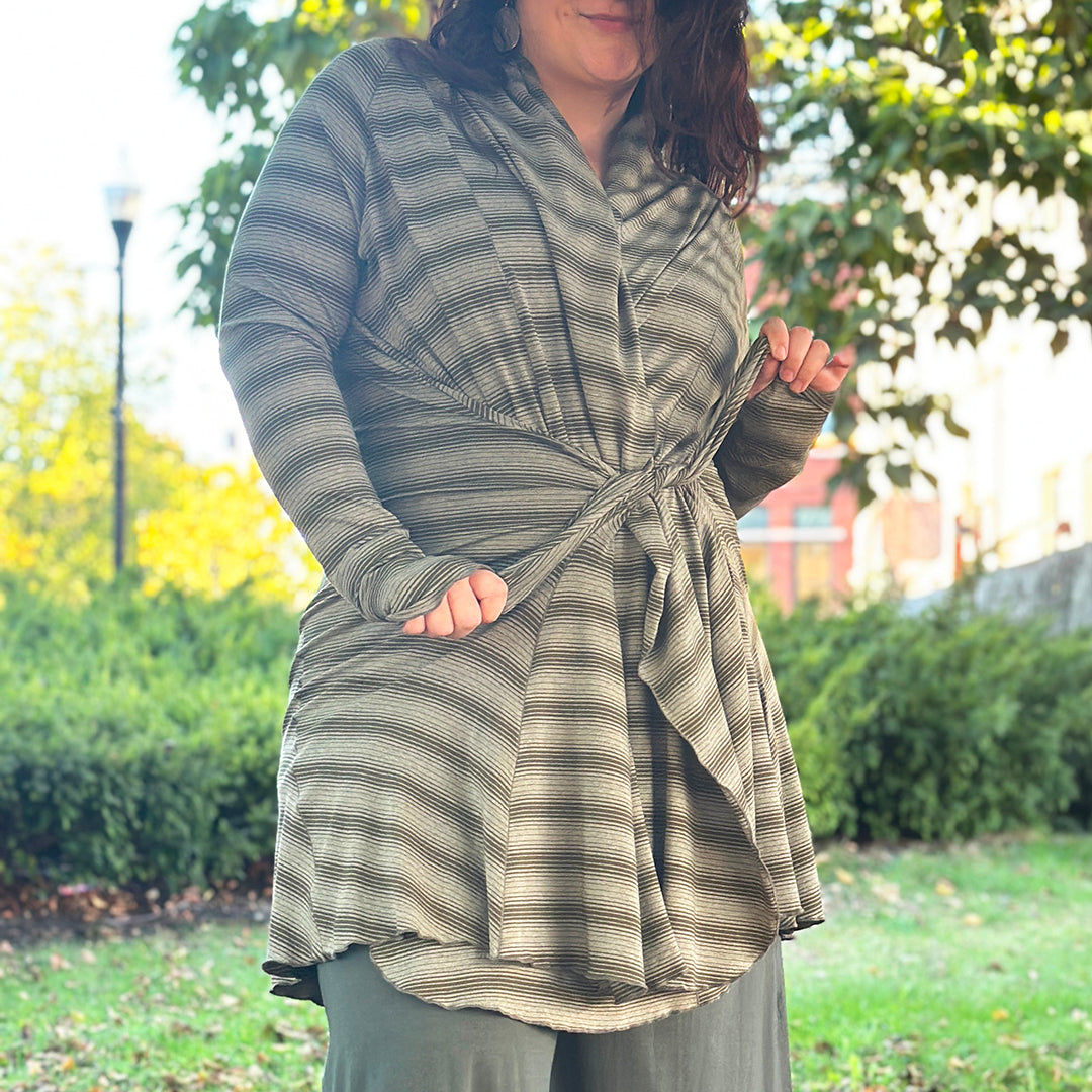 riding coat jacket in country stripe using pockets to close