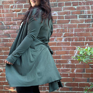 pine riding coat with pockets tied in back for bustle - refer to swatch for more true pine color