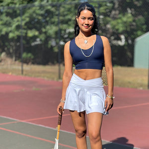 birdie short in white with balance bra in navy