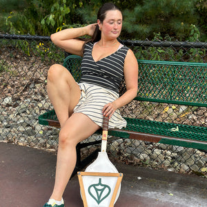 cross top in yin stripe with birdie short in yang stripe