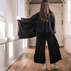 prima jacket in black paired with cross top in ballet and harlow pants in black 