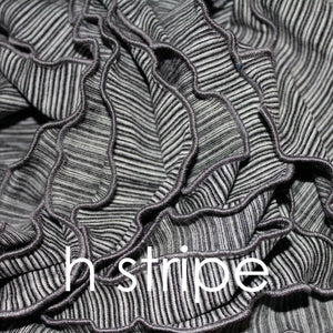 Cape sans manches à plusieurs niveaux MANTRA