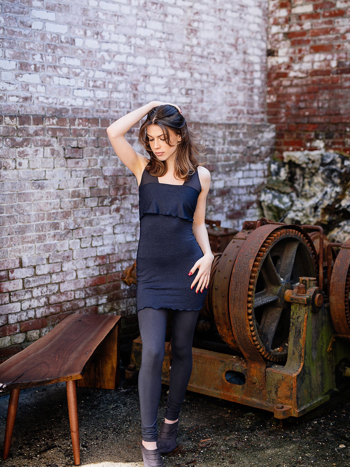 base legging in carbon paired with balance bra in carbon and hourglass in midnight worn as a dress