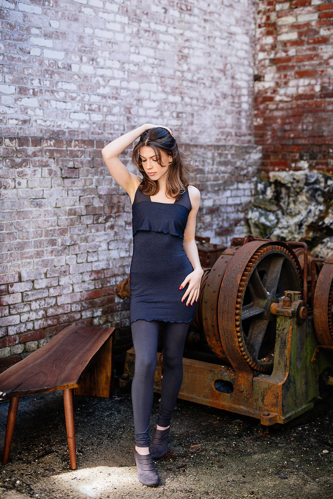 base legging in carbon paired with balance bra in carbon and hourglass in midnight worn as a dress