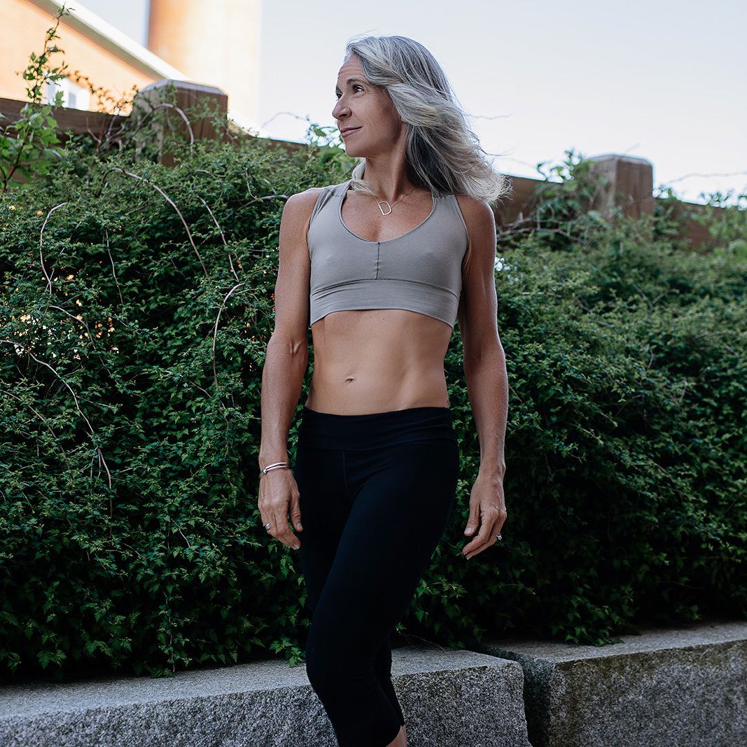 balance bra in clay styled with black capri
